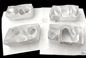 Black and white architectural models made of paper