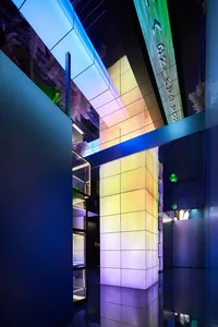 Modern minimalist interior with glass elements, designed to evoke sleek, clean lines and an open, airy feel.