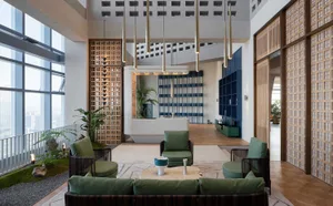 Modern residential living room with concrete, wood, and leather materials