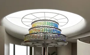 A decorative lighting fixture made of colorful glass tubes arranged in a tiered, circular design.