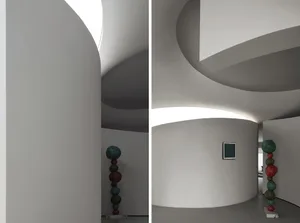 A modern interior space featuring contemporary lighting fixtures.