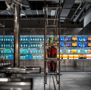 A minimalist storefront featuring transparent glass panels and sleek, modern design.