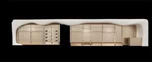 A modern interior of a clothing store with white walls, glass display cases, and wooden shelves.