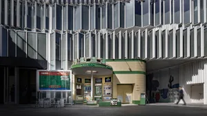 A modern retail space featuring glass and concrete materials.
