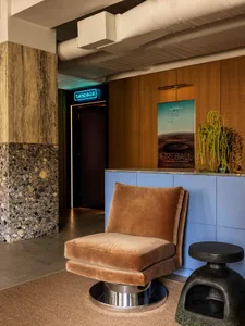 Modern advertisement featuring concrete and wood materials