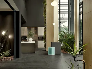 Modern interior design featuring concrete and steel materials in a commercial space.