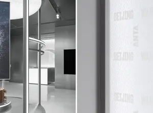 A modern retail storefront featuring glass and metal materials.