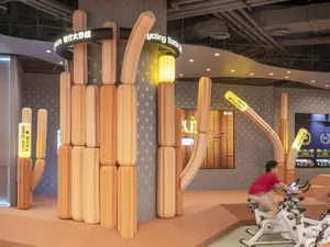 An interior design space featuring modular wooden blocks