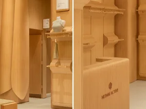A modern furniture store interior with wooden shelves and displays.