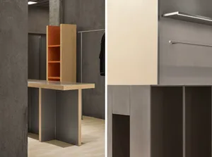 Modern metal clothing wardrobe featuring minimalist design and functional storage solutions.