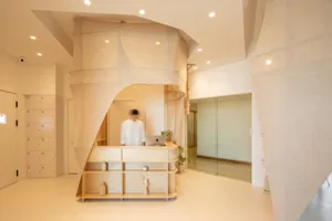 Modern reception desk with fabric elements in an interior setting