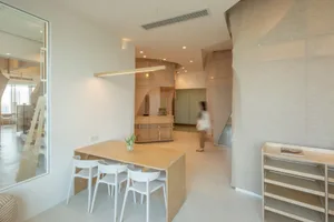 Modern residential kitchen featuring wooden furniture mix