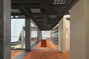 A modern retail space with a concrete interior design.