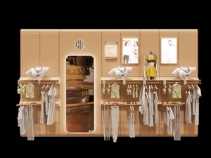 A modern retail store featuring clothing and accessories, with a glass entrance and wooden display stands.
