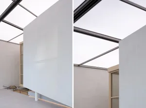 Modern interior design featuring concrete walls and ceiling.