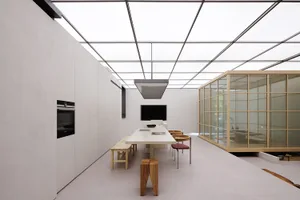 Modern kitchen with white cabinets, white countertops, and white flooring.