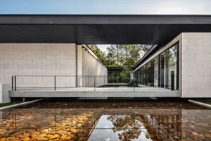 Modern architectural exterior featuring concrete materials and minimalist design.