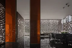 A modern interior design with brick and glass materials.