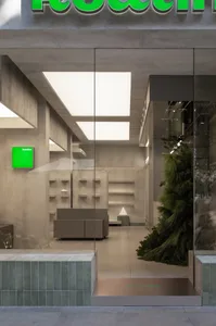 Modern retail storefront featuring a concrete interior design