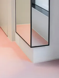 Modern minimalist interior design featuring concrete and glass elements