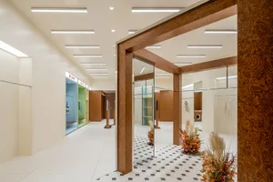 Modern retail space featuring wood finishes and elegant design elements