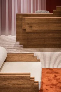 A modern interior design featuring a wooden reception desk.