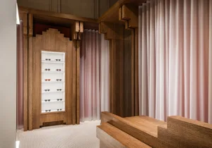 Modern retail interior with wooden sunglasses display case