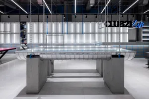 Industrial interior design featuring concrete materials in a spacious and modern setting.