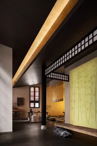 A modern residential space featuring wooden elements and natural light.