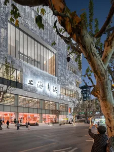 Modern library with large glass facade and concrete structural elements