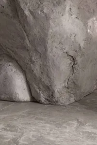 Concrete interior details showcasing structural elements in a grey environment.