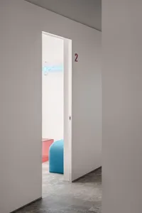 Modern office space with minimalist design and white materials