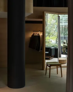 A modern retail store with wooden and metallic elements.