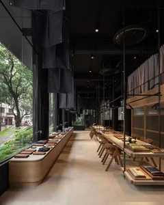 Modern minimalist storefront with sleek lines and contemporary design elements.