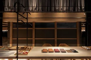 A modern retail storefront featuring wood materials with a minimalist design aesthetic.