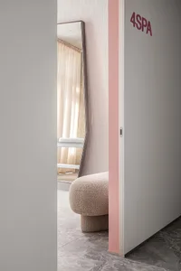 Spa interior with a textured upholstered seat and soft lighting