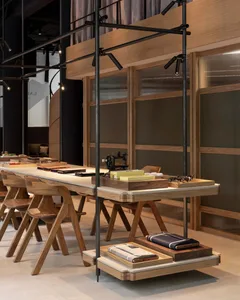 An industrial-style display counter featuring a wooden accent.