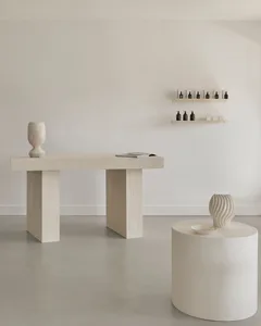 Modern minimalist interior design featuring clean lines and concrete finishes.