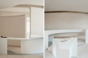 極簡室內空間，展現混凝土、灰泥與木質表面。