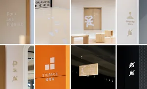 Modern interior design showcasing multiple signage elements and design features.