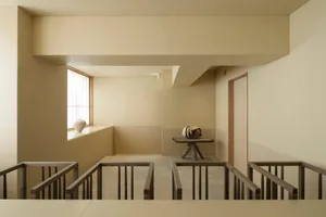 A modern interior space featuring high contrast lighting.