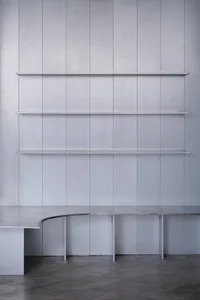 Industrial-style interior with concrete shelving.