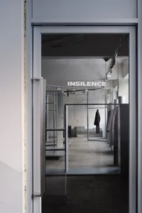 Modern clothing store with concrete minimalist interior design.