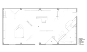 A 2D architectural drawing of a retail space showing display areas and functional zones.