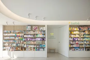 A well-lit, modern baby store filled with various products and displays.
