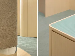 Modern office space featuring wood finishes and textured flooring