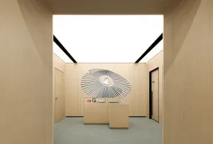 A minimalistic retail storefront interior with modern materials and a clean design.
