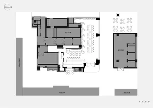 Detailed architectural floor plan with labels and dimensions indicating rooms and pathways.