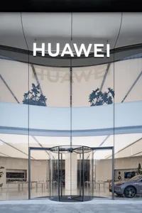 Modern Huawei storefront featuring glass and metal materials.