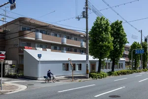 A modern residential house with white walls and a minimalist design.
